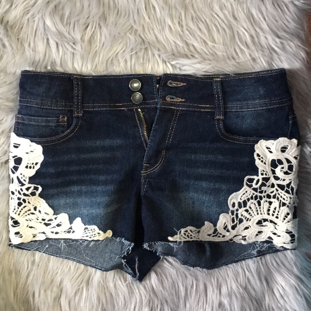 dark blue shorts with white lace detailing